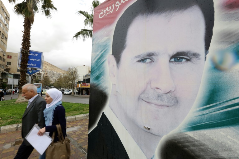 Un portrait du président syrien Bachar al-Assad à Damas, le 15 mars 2016. © AFP