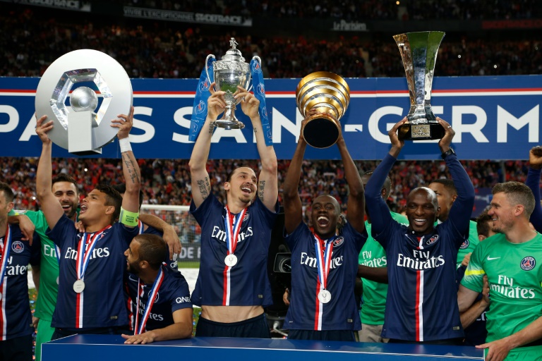 Le PSG présente son quadruplé: Ligue 1, Coupe de France, Coupe de la Ligue et Trophée des champions, le 30 mai 2015 au Stade de France. © AFP